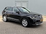 Volkswagen Tiguan 1.4 TSI eHybrid Elegance Business+ / Dealer onderhouden / Elektrische trekhaak (1800 kg) / Accu SoH 94.4 % / Navigatie / Apple Carplay Android / Stuur- en stoelverwarming / Parkeer assistent / 18" LM wielen /