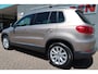 Volkswagen Tiguan 1.4 TSI Sport&Style BlueMotion Bij ons bedrijf in onderhoud geweest