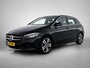 Mercedes-Benz B-klasse 180 Business Solution Luxury Trekhaak | Parkeerpakket met achteruitrijcamera | Ledkoplampen | Sfeerverlichting | Stoelverwarming. Inclusief 24 maanden MB Certified garantie voor Europa.