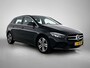 Mercedes-Benz B-klasse 180 Business Solution Luxury Trekhaak | Parkeerpakket met achteruitrijcamera | Ledkoplampen | Sfeerverlichting | Stoelverwarming. Inclusief 24 maanden MB Certified garantie voor Europa.