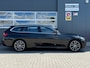 BMW 3-Serie Touring 318d High Executive | Navi Prof | HK Audio | 18 inch | Leder | LED | Stoelverw. | CarPlay | 3-zone Clima | PDC