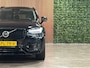 Volvo XC90 T8 AWD Recharge Ultra Dark | Vol! | Bowers & Wilkins | Luchtvering | Stoelventilatie | Trekhaak | 360 Camera | Head-Up Display | Stoelmassage | 455pk | Adaptieve Cruise Control | Stoelverwarming voor+achter | Stuurwielverwarming | Schuifdak | 20 Inch | Full LED Meesturende koplampen | Pilot Assist | BLIS Dode Hoek Detectie | Alcantara hemelbekleding | Lederen handgrepen en zonnekleppen | Elektrische voorstoelen geheugen | Nappa Lederen bekleding | Zitting verlenging voorstoelen | Lederen Dashboard | Google Infotainment | Keyless Drive | Parkeersensoren voor+achter | Privacy Glass | Elektrisch bedienbare achterklep | Geïntegreerde zongordijnen achterportieren | Geïntegreerd kinderzitje achterin | Verlichte instaplijsten | 7-Persoons | 4-Zone Climate Control | DAB Radio | Apple Carplay/Android Auto | Alarm Klasse III | Draadloos telefoon opladen | Volvo On Call met mobiele App functie | Onyx Black Metallic |