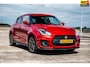 Suzuki Swift 1.4 Sport Smart Hybrid | Airco/Clima | Adaptive Cruise Control | Camera | Stoelverwarming | LM Velgen |