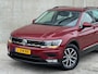 Volkswagen Tiguan 1.4 TSI 150PK 2016 Rood TREKHAAK|NAP|PDC|NAVI