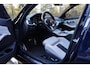 BMW M3 3-serie Competition | Tansanitblau II metallic | Carbon dak | Sport uitlaat | 1e Lak