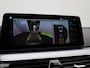 BMW 5-Serie Touring 520e Business Edition Plus | Automaat | Panoramadak | CoPilot Pack | Apple Carplay / Android Auto | Navigatie | Harman-Kardon | Laser Lights | Memory Seats | Stoel/Stuur verwarming | Digital Cockpit | Leder | Parkeer sensoren | Electrische achterklep | 360 Camera | 4-Zone Climate control | Adaptieve Cruise control | DAB | Achterbank Verwarmd | Zonneschermen | Dodehoekdetectie | Lichtmetalen Velgen |
