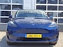 Tesla Model Y RWD 58 kWh | Navigatie | LM Velgen 20"| Voorstoelen/Achterbank/Stuur Verwarmd | Panoramadak | Achteruitrijcamera | Cruise Control | Airco |