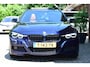 BMW 3-Serie Touring 330i Individual M Pakket Sport Shadow line Panoramadak | H&K Audi | Headup