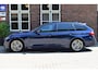 BMW 3-Serie Touring 330i Individual M Pakket Sport Shadow line Panoramadak | H&K Audi | Headup