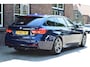 BMW 3-Serie Touring 330i Individual M Pakket Sport Shadow line Panoramadak | H&K Audi | Headup