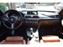 BMW 3-Serie Touring 330i Individual M Pakket Sport Shadow line Panoramadak | H&K Audi | Headup