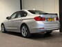 BMW 3-Serie 320i High Executive (GROOT NAVI, H&K AUDIO, STOELVERWARMING, CRUISE)