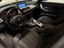 BMW 3-Serie 320i High Executive (GROOT NAVI, H&K AUDIO, STOELVERWARMING, CRUISE)