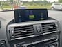 BMW 1-Serie 116i Sport-Line Business+ | 1e eig. | NAP | Navi Prof. | 18" BMW LM velg sterspaak 379 | Schuifdak | Bi-Xenon | M-Sport onderstel