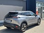Peugeot 2008 1.2 Hybrid 145 PK Allure | Automaat Hybride | Slechts 10.800 KM Gereden | Navigatie | Keyless Entry | Climate Control | Cruise Control | Parkeersensoren V+A | LED Verlichting | Grip Control | All Season Banden | Half Lederen Bekleding | Hoge Zitpositie |