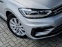 Volkswagen Touran 1.4 TSI Highline Edition R 7p | Camera | Navigatie | Apple Carplay | Android Auto | Adaptieve Cruise Control | Matrix LED | Stoelverwarming | Climate Control | 7 Persoons | All Season Banden | Metallic Lak | R-Line |