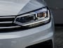 Volkswagen Touran 1.4 TSI Highline Edition R 7p | Camera | Navigatie | Apple Carplay | Android Auto | Adaptieve Cruise Control | Matrix LED | Stoelverwarming | Climate Control | 7 Persoons | All Season Banden | Metallic Lak | R-Line |