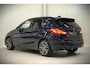 BMW 2-Serie Active Tourer 225xe iPerformance eDrive Edition | Stoelverwarming | Head-Up Display | Cruise Control | Parkeersensoren | Ambiance Verlichting | LED | Navigatie | Keyless | Leer | SOH 87%