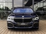 BMW 7-Serie 750i xDrive High Executive | M-SPORT | TANSANITBLAU | INTEGRAL ACTIVE STEERING | STOELMASSAGE | STOELVENTILATIE | SCHUIF-KANTELDAK | TREKHAAK | HEAD-UP | SOFTCLOSE | DRIVING ASSIST.PROF | HARMAN KARDON |