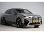 BMW iX XDrive40 M-sport | panoramadak skylounge | elek. trekhaak | softclose | laser led | harmankardon | massage | hud | BTW
