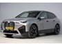 BMW iX XDrive40 M-sport | panoramadak skylounge | elek. trekhaak | softclose | laser led | harmankardon | massage | hud | BTW