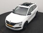 Skoda Karoq 1.5 TSI ACT Sportline DSG 150pk Dealer O.H | Panodak | Adaptive Cruise | Camera | RS Sportstoelen Verwarmd | Blis | Keyless | Apple Carplay | Black Optic | Virtual | Navigatie | DAB | 18"L.M |