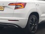 Skoda Karoq 1.5 TSI ACT Sportline DSG 150pk Dealer O.H | Panodak | Adaptive Cruise | Camera | RS Sportstoelen Verwarmd | Blis | Keyless | Apple Carplay | Black Optic | Virtual | Navigatie | DAB | 18"L.M |