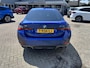 BMW i4 eDrive40 High Executive 84 kWh 340pk | M Sport pakket | Open Dak | Elektrische Achterklep | Adaptieve Cruise | All Season banden