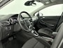 Opel Astra Sports Tourer 1.6 Innovation | Trekhaak | Bluetooth | Cruise Control | Electronic Climate Controle | Lederen Stuurwiel | Lichtmetalen Velgen | Parkeersensoren | Stuurwiel Multifunctioneel | Achteruitrijcamera | Comfortstoelen | Stof/Lederen Bekleding
