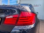 BMW 5-Serie 520i High Executive|Trekhaak|Navi|Climate|PDC