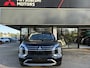Mitsubishi Outlander 2.4 PHEV First Edition NIEUW UIT VOORRAAD LEVERBAAR | 2-zone Climate Control | Adaptieve Cruise Control | Parkeersensoren voor- en achter (8) | 20" lichtmetalen velgen | Blind Spot Warning | Apple CarPlay & Android Auto | Synthetisch lederen bekleding | 8 jaar fabrieksgarantie