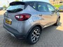 Renault Captur 0.9 TCe Intens met parkeersensoren en navigatie en bluetooth telefoon / media en airco en cruise controle