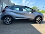 Renault Captur 0.9 TCe Intens met parkeersensoren en navigatie en bluetooth telefoon / media en airco en cruise controle