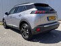 Peugeot 2008 1.2 100PK Allure Pack | Navigatie | Apple Carplay / Android Auto | Cruise Control | Parkeersensoren Achter | DAB | | Bots waarschuwing systeem | Buitenspiegels elektrisch verstel- en verwarmbaar | DAB ontvanger