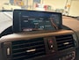BMW 1-Serie M135i xDrive High Executive | Performance | Pano