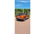 Peugeot e-2008 EV Allure Première 1 fase 50 kWh | Nappa Leder | Stoelverwarming | Camera | Warmtepomp | Orange Fusion