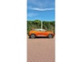 Peugeot e-2008 EV Allure Première 1 fase 50 kWh | Nappa Leder | Stoelverwarming | Camera | Warmtepomp | Orange Fusion