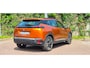 Peugeot e-2008 EV Allure Première 1 fase 50 kWh | Nappa Leder | Stoelverwarming | Camera | Warmtepomp | Orange Fusion