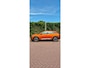 Peugeot e-2008 EV Allure Première 1 fase 50 kWh | Nappa Leder | Stoelverwarming | Camera | Warmtepomp | Orange Fusion