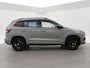 Skoda Karoq 1.5 TSI ACT SPORTLINE + WEGKL. TREKHAAK | VOL LEDER | ADAPTIVE CRUISE | CANTON | CAMERA