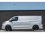 Ford E-Transit Custom L2H1 218Pk Aut. | Elektrisch | Limited 340 | 2xSchuifdeur | Spoilerpack | 360° Camera | 19'' | Moondust Silver
