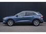 Ford Kuga 1.5 EcoBoost Titanium X | 100% dealer o.h. | Panoramadak | Adaptieve cruise | Trekhaak | Privay glass | Helf leder | B&O Audio | Camera  | 1800kg trekgewicht