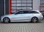 Mercedes-Benz C-klasse Estate 300 e AMG Line 313PK | Pano | Luchtvering | Air-Balance | MBUX | Burmester | Night Pakket | Ambient+ | Laser Led | Massage | Stoelventilatie & Verwarming | Stuurwielverwarming | Head-Up | Trekhaak | Cruise | Camera | Keyless