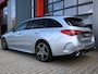 Mercedes-Benz C-klasse Estate 300 e AMG Line 313PK | Pano | Luchtvering | Air-Balance | MBUX | Burmester | Night Pakket | Ambient+ | Laser Led | Massage | Stoelventilatie & Verwarming | Stuurwielverwarming | Head-Up | Trekhaak | Cruise | Camera | Keyless