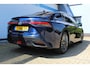 Toyota Mirai Prestige | Incl. 12 maanden Garantie | Stoelverwarming voor & achter | Stoelventilatie voor & achter | Stuurverwarming | Head-Up display | Adaptive cruise | Climate controle | 360* Camera | JBL Audiosysteem | Elektrisch verstelbare stoelen met memory | Dodehoekdetectie | Keyless entry/start | Origineel NL Auto | NAP |
