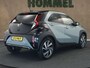 Toyota Aygo X 1.0 VVT-i S-CVT Envy - ORIGINEEL NEDERLANDE AUTO - ACHTERUITRIJCAMERA - AUTOMATISCHE AIRCO - APPLE CARPLAY/ANDROID AUTO - NAVIGATIESYSTEEM FULL MAP - ADAPTIEVE CRUISE CONTROL - RIJSTROOKSENSOR MET CORRECTIE - VERKEERSBORDDETECTIE - LED KOPLAMPEN - GROOTLICHTASSISTENT - DRAADLOZE TELEFOONLADER - PARKEERSENSOREN VOOR EN ACHTER - LICHTMETALEN VELGEN 18" - EXTRA GETINT GLAS - TWO-TONE LAK MET ZWART DAK