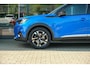 Peugeot e-2008 EV GT 50 kWh | 3-Fase | ACC | 3d Dash | Stoelverwarming | Ambiant verlichting | Keyless entry en start | All seasons | Sportstoelen | Zwarte hemel