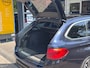 BMW 5-Serie Touring 520i High Executive M-SPORT / PANO / MEMORY / TREKHAAK