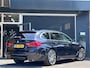 BMW 5-Serie Touring 520i High Executive M-SPORT / PANO / MEMORY / TREKHAAK