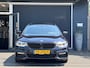 BMW 5-Serie Touring 520i High Executive M-SPORT / PANO / MEMORY / TREKHAAK